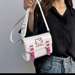 Hello Kitty White and Pink Crossbody Bag with Buckle Accents